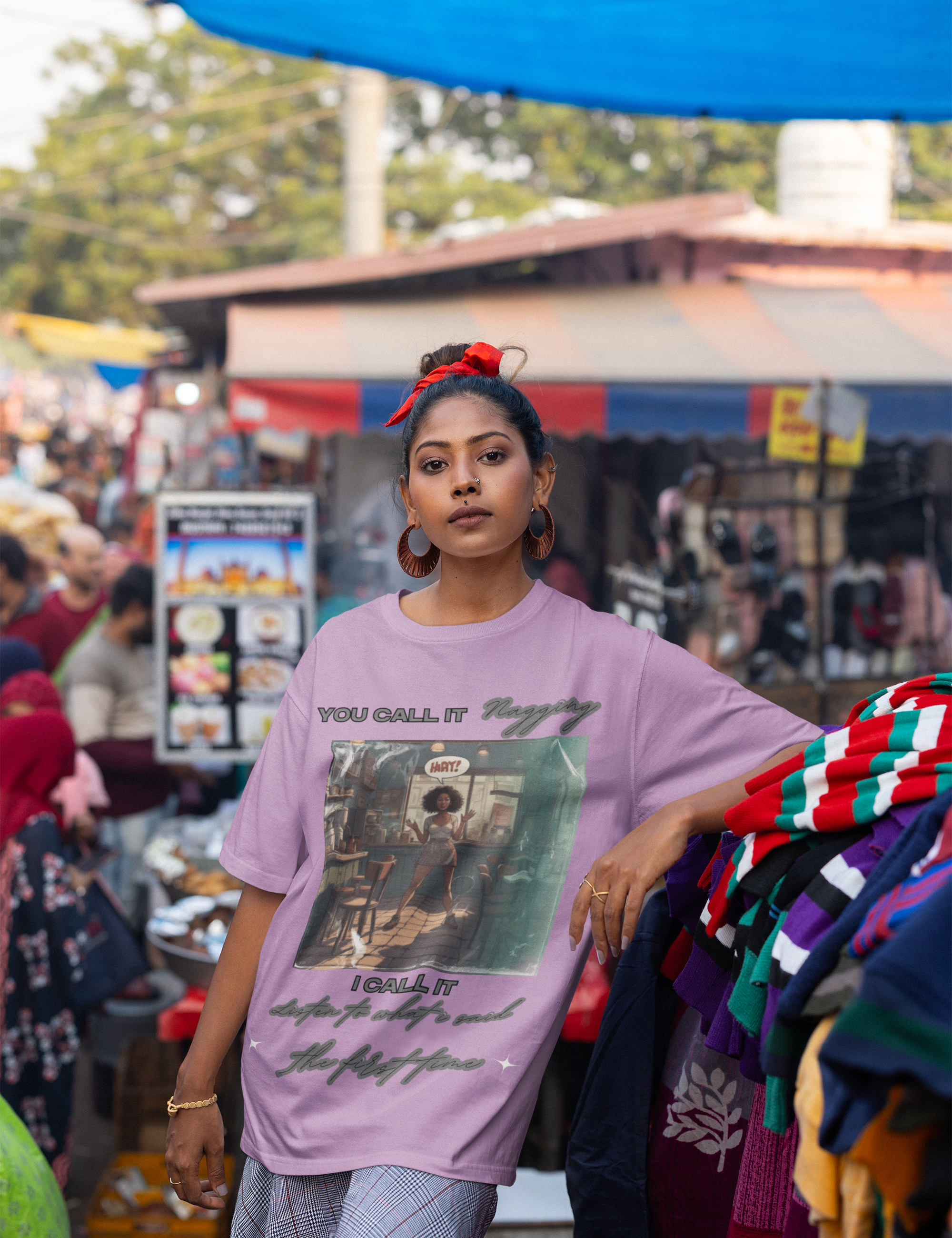 mockup-featuring-a-woman-wearing-an-oversized-blinkstore-t-shirt-at-an-urban-market-m37399.png
