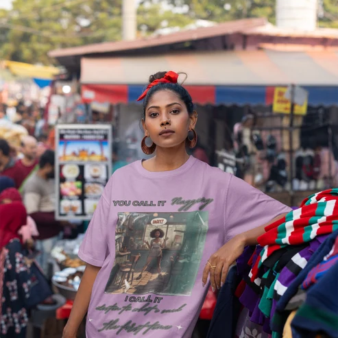mockup-featuring-a-woman-wearing-an-oversized-blinkstore-t-shirt-at-an-urban-market-m37399.webp