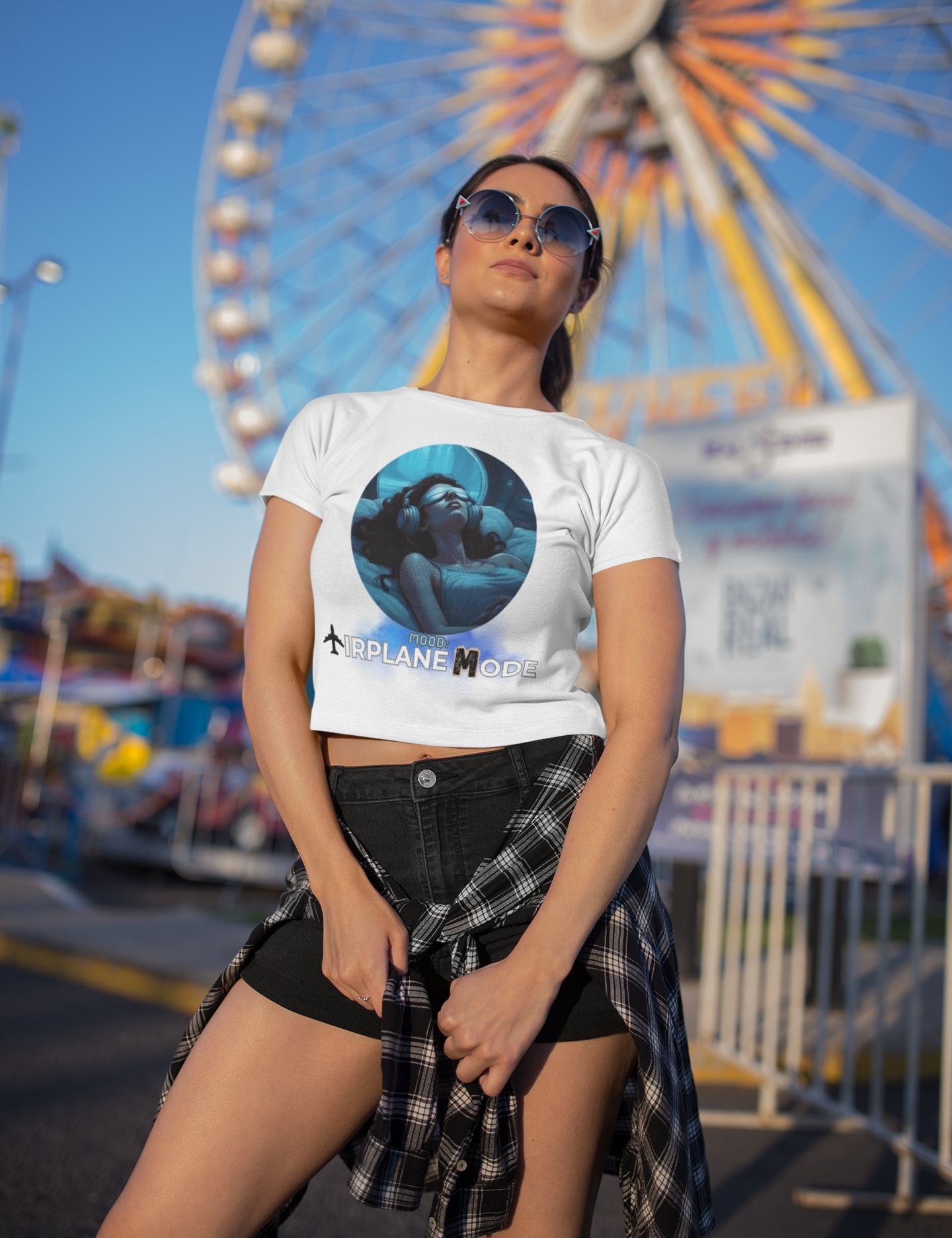 portrait-of-a-woman-wearing-a-crop-top-tee-mockup-at-an-amusement-park-a19428.png